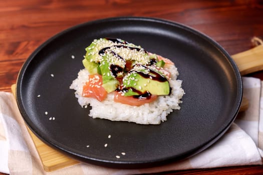 Sushi Waffles food trend, made with a crispy rice waffle and topped off with salmon, cucumber, and avocado.