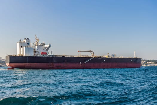 Container cargo ship in the Bosphorus, Istanbul, Turkey.