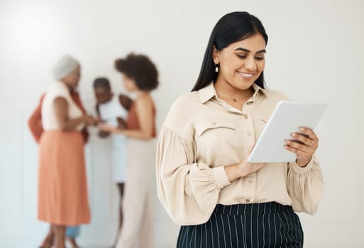 Business woman, tablet and typing online with a smile for communication, internet and network. Happy female entrepreneur working on touch screen for social media, leadership report or search.