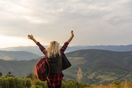 woman backpacker enjoy the view at mountain.