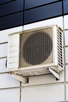 Air conditioning on the wall of the building close up