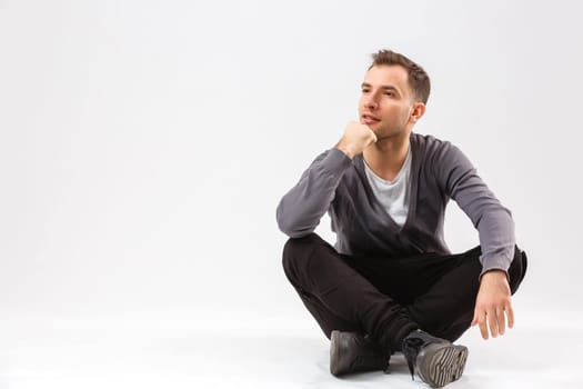 man thinking over gray background