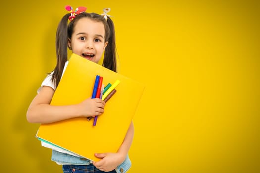 funny child school girl girl on yellow background