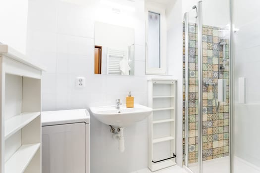 a bathroom in an apartment of a residential building. High quality photo