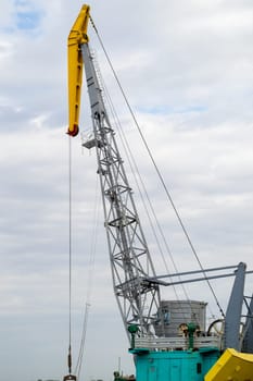 Luffing crane against of blue sky. High quality photo