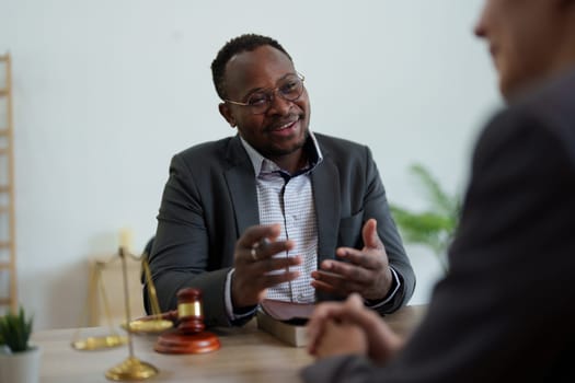 african american attorney, lawyers discussing contract or business agreement at law firm office, Business people making deal document legal, justice advice service concepts.