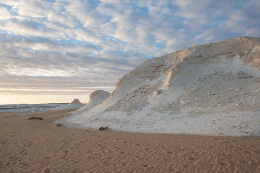 Landscape scenic view of desolate barren western desert in Panoramic barren landscape in Egypt Western White desert with geological chalk rock formations