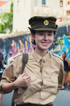 Hel, Poland - August 2022 Military troops marching during 3 May Polish Constitution Day ceremonial patriotic parade. Polish armed forces tanker military parade. Old guns and cars. Feast of Polish Armed Forces Day, American soldiers with US flag on parade Nato Vehicles Military Equipment