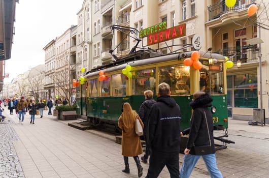 Poznan, Poland - February 4, 2023: Restaurant - fast food tram on the central pedestrian street of the city.
