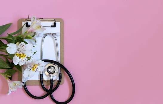 Medical equipment on pink background. International nurses week. Congratulation for nurse day, space for text