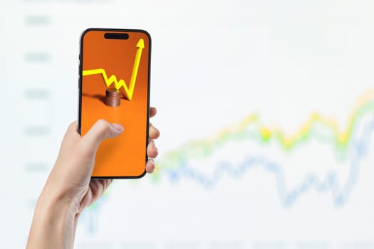 Phone in hand against the background of investment chart, investment concept, broker services, real estate value, economic growth, dividend payout, copy space.