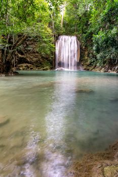 Clean green emerald water from the waterfall Surrounded by small trees - large trees,  green colour, Erawan waterfall, Kanchanaburi province, Thailand