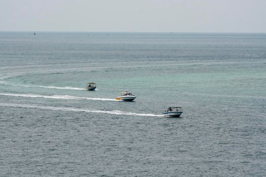 Small speed boat Compete for time to get people across the sea.