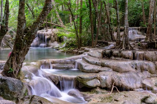 Clean green emerald water from the waterfall Surrounded by small trees - large trees,  green colour, Erawan waterfall, Kanchanaburi province, Thailand