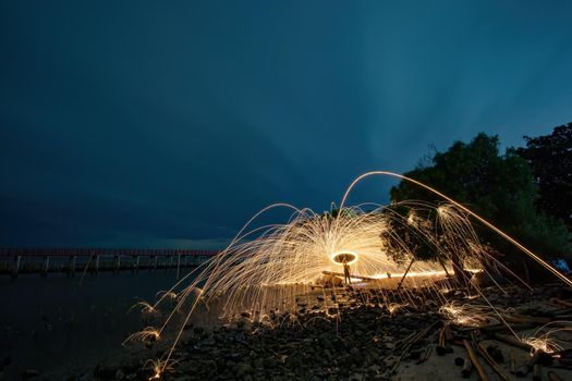 Playing with flames Holding a fire to cause flakes