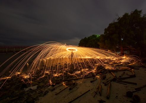 Playing with flames Holding a fire to cause flakes