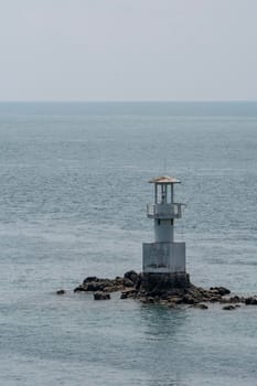 Seaside lighthouse And seems to be in the sea when the water rises