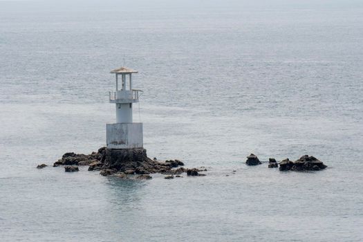 Seaside lighthouse And seems to be in the sea when the water rises