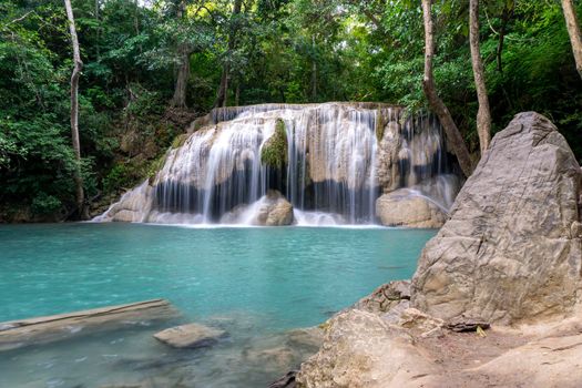 Clean green emerald water from the waterfall Surrounded by small trees - large trees,  green colour, Erawan waterfall, Kanchanaburi province, Thailand