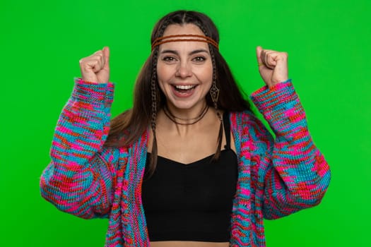 Happy joyful hippie woman shouting, celebrating success, winning, birthday, lottery jackpot goal achievemen, good news, victory, lucky fortune. Young happy girl on chroma key background, green screen