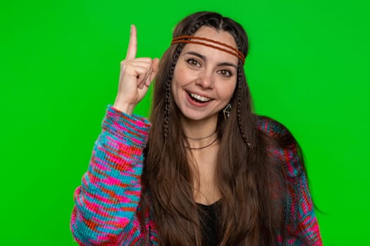 Eureka. Inspired young woman pointing finger up with open mouth, having good idea plan startup, showing inspiration motivation gesture, problem solution. Hippie girl isolated on chroma key background