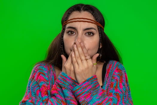 I will not say anything. Frightened woman closing mouth with hands looking intimidated scared at camera gestures No, refusing to tell terrible secret, unbelievable truth. Girl on chroma key background