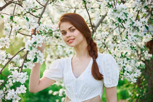 Spring woman in summer dress walking in park. High quality photo