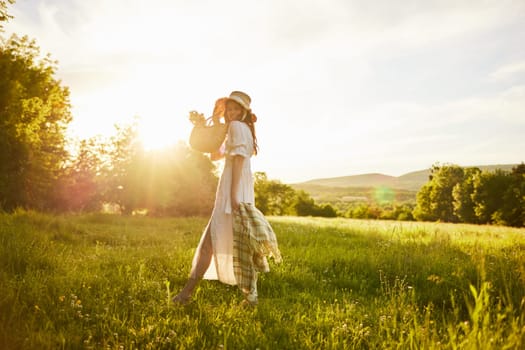 horizontal photo of a woman in a long light dress walking through the forest, illuminated from the back by the rays of the setting sun. High quality photo