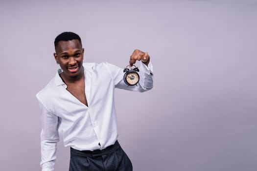 Happy african american young businessman in a formal suit. Smiling confident black guy