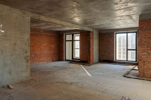Repair and restoration of apartments. Red brick walls, concrete floors