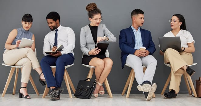 Talking, waiting room and business people with tech in office, checking time and planning. Meeting, team and corporate employees getting ready for interview, networking and helping with work.