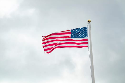 National flag of the USA waving in the wind.