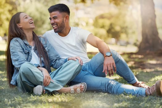 Couple are happy outdoor, laughing and relax together, love and care with trust in relationship and commitment. Happiness, support and freedom with man and woman in park with romance and bonding.