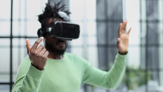 A man is looking for bright impressions using gadgets.