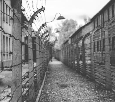 Poland, Auschwitz - April 18, 2014: Electric fence in former Nazi concentration camp Auschwitz I
