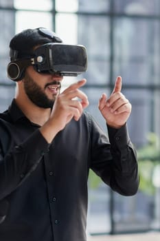 Businessman with virtual reality headset at office