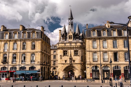 Bordeaux, France - 28 August 2022: Old gate entrance to the city of Bordeaux (Porte Caihau). Beautiful sightseeing building in the center of Bordeaux, France.