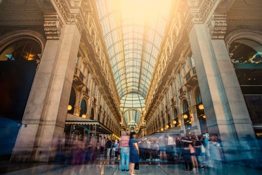 Milan, Italy - 16 August 2019: Noisy Milan Gallery full of tourists. Galleria Vittorio Emanuele II