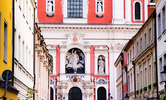 Poznan Fara - Roman Catholic basilica. Old beautiful building facade with statues in historical Poland city in Europe.
