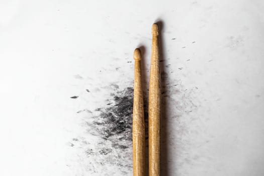 Drumsticks for drum live perfomance closeup. Wooden musical sticks for percussion instruments