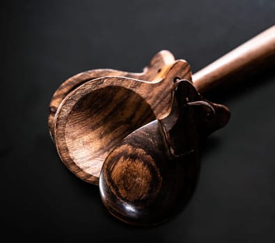 Wooden castanet for flamenco dance closeup. Traditional hispanic musical instrument for live perfomance and latin culture