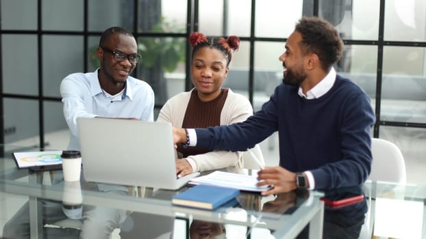 African american business team talking about strategy