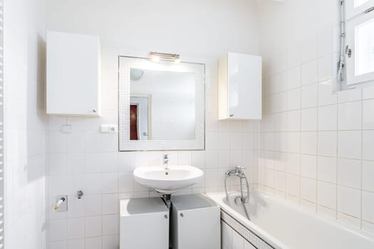 a bathroom in an apartment of a residential building. High quality photo