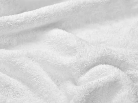 close up of a white towel bathroom on white background