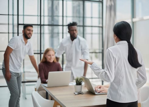 Businessmen and businesswomen talking during a meeting