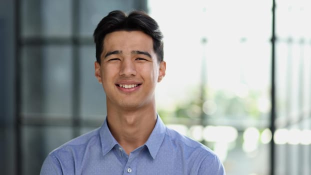 Portrait of a successful Asian businessman, in a modern office building