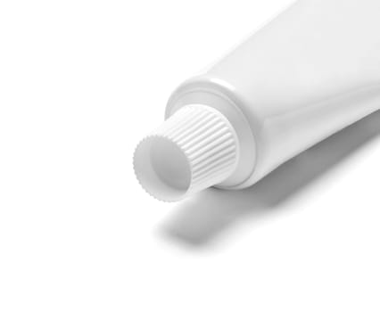 close up of a toothpaste or beauty cream tube on white background