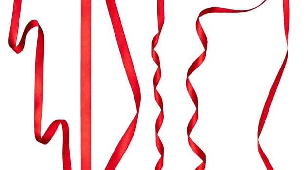 collection of various red ribbon pieces on white background. each one is shot separately