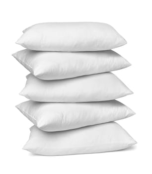 close up of a white pillow on white background