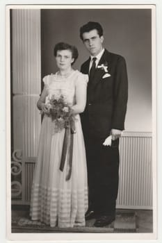 THE CZECHOSLOVAK SOCIALIST REPUBLIC - CIRCA 1970s: Vintage photo shows a newlyweds. Retro black and white photography. Circa 1970s.